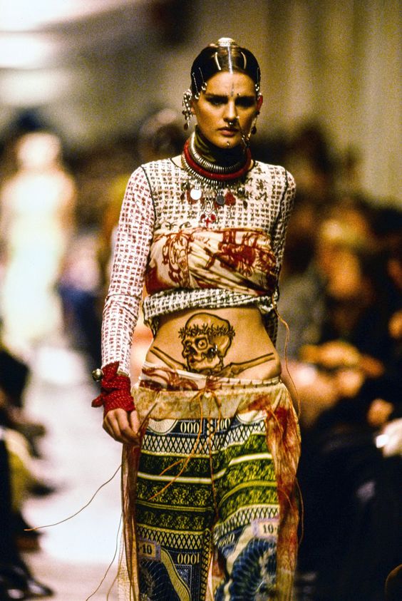 Runway model showing off skull tattoo