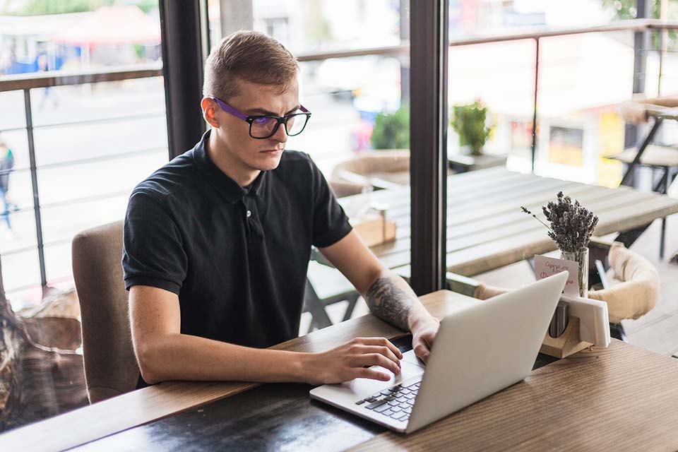 tattoo artist writing a business plan