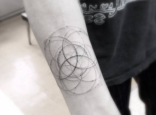  body art design made with single tattoo needle in black ink