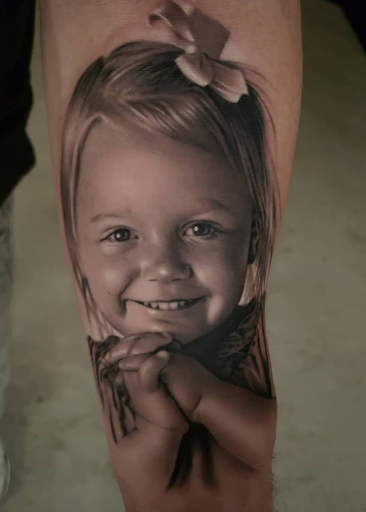 body art of daughter on forearm