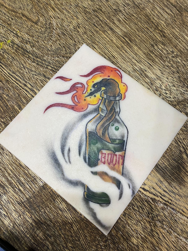 flash tattoo done in a tattoo parlor