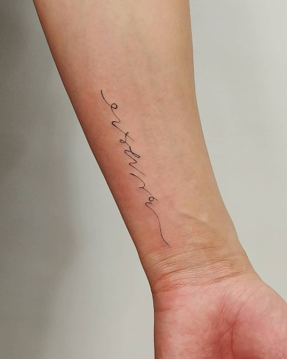 Fine line script tattoo 