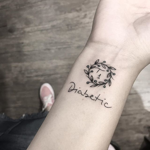 Medical alert tattoos showing that the client is a Type 1 diabetic