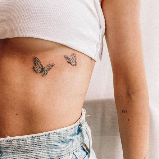 Mela butterfly tattoo