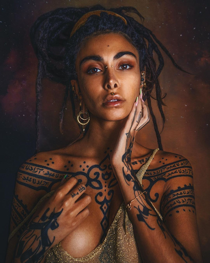 Model with tattoos for The Free Elf in London 