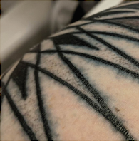new tattoo heals with blown out lines