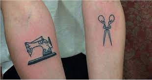 Sewing machine and scissors tattoos