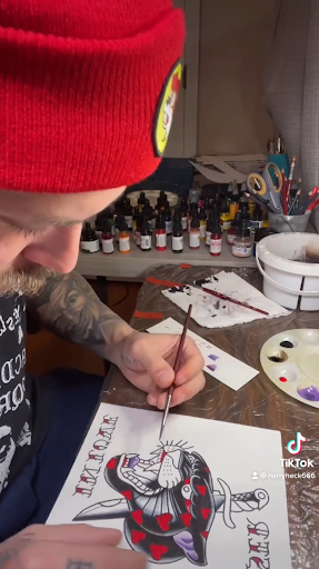 tattoo artist painting