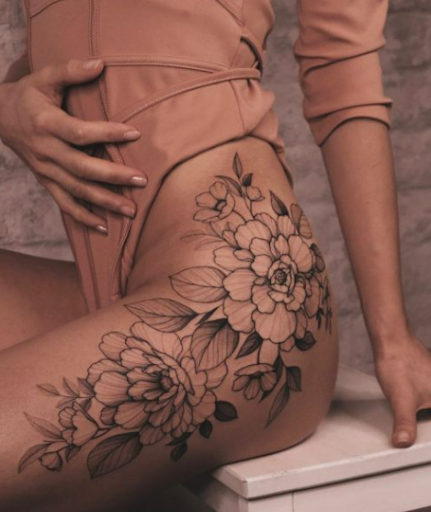 upper thigh tattoo